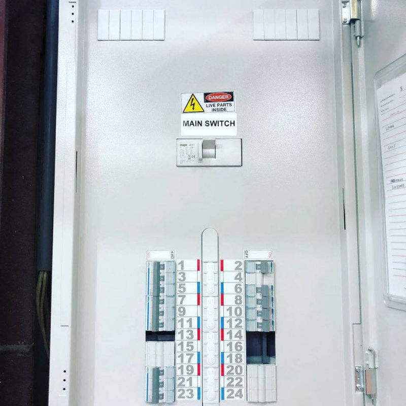 Photo of a commercial Hager switchboard installed at a car mechinal workshop