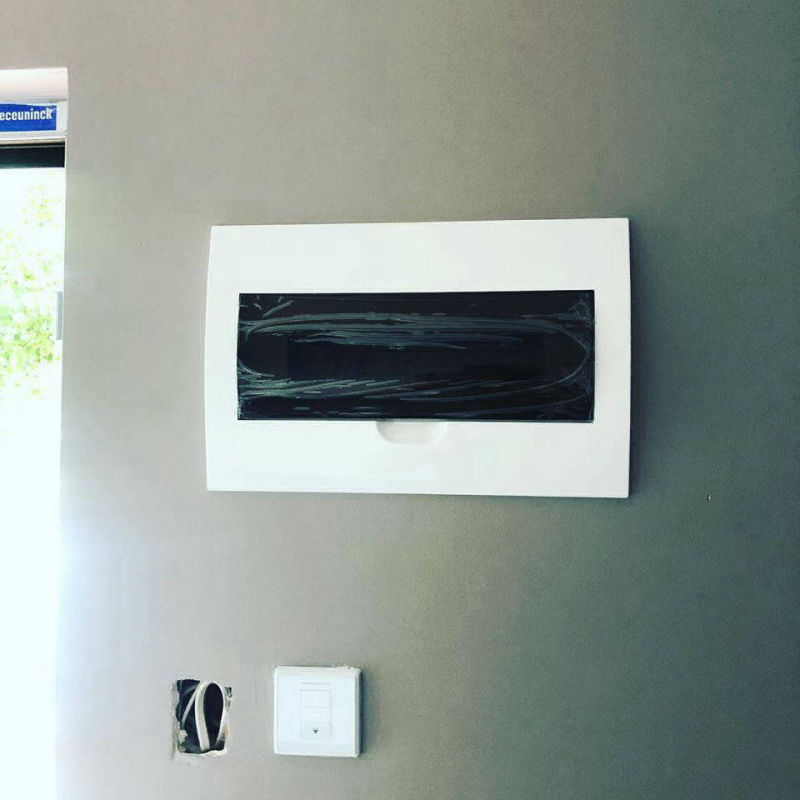 Photo of Voltex switchboard, recessed in a wall at a new home and switch not finised installed